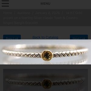 14 KT Gold accent on a Sterling Silver classic Town & Country hinged Bangle